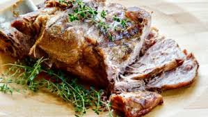 To make this roast pork shoulder recipe, you peel back the skin and make incisions in the meat, which allows the garlicky marinade to seep in. Img Sndimg Com Food Image Upload C Thumb Q 80 W
