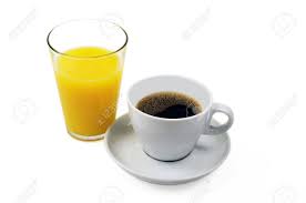 The bitterness is an integral part of the beverage, balanced by the other elements, in this case, sparkling water, orange juice, and orange peel. A Coffee Cup With Hot Good Coffee And A Glass Of Orange Juice Stock Photo Picture And Royalty Free Image Image 16419571