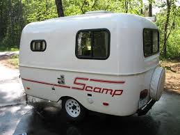 Camping trailers under 1000 pounds. The Scamp Is A 13 Fiberglass Egg Trailer It Weights In Around 1000 Lbs And Has A Tongue Weight Of Only 60 70 Lb Scamp Trailer Camping Small Travel Trailers