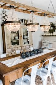 Chandeliers instantly add sophistication to any room, whether it's a dining room or bathroom. The Chandeliers Are Hung Liz Marie Blog