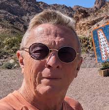 Can I take a photo with my photographer at the slot machine at Caesars? I  know at the tables may be hard and require approval. Just wanted ONE  picture at slot machine.