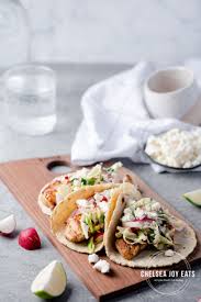 What kind of cheese on fish tacos. Walleye Fish Tacos With Radish Slaw Chelsea Joy Eats