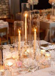 Glamorous Wedding Ideas With Stunning Decor Modwedding Wedding Centerpieces Candle Wedding Centerpieces Wedding Table Centerpieces