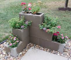 It might give it a slightly muddy shine to it, but i think that makes it look even better! Cement Block Planter Cinder Block Garden Plants Backyard Landscaping