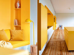 1920 S Apartment Rejuvenated With Warm Shades Of Yellow Apartment Architecture Warm Yellow Living Room Apartment Interior Design