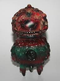 This design is on a womens fit t shirt and features a htv design along with slash marks all the way through the back of the shirt to simulate freddys blades ripping the shirt. Kaiju Tan Mimi Monster Freddy Krueger V2