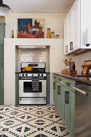 We opted to paint everything soot — the walls, baseboard, fireplace mantel (yep, there's a fireplace in the kitchen because: 18 Best Painted Floors Painting A Floor Ideas