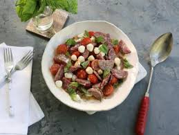 In a medium bowl, combine the tomatoes, minced garlic, balsamic vinegar, basil, salt, and pepper. Tomato Crostini With Whipped Feta Recipe Ina Garten Food Network