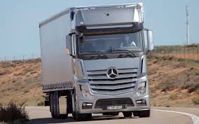 Funky Bunch Ford Mercedes Benz Try New Designs On Big Rig Trucks Big Rig Trucks Mercedes Benz Trucks