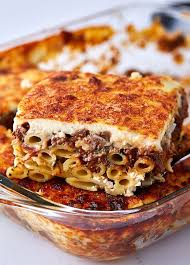 A Traditional Greek Pastitsio Pasticcio Recipe Layers Of Ziti Pasta Beef Sauce Bechamel Sauce Sprinkled With Fet Greek Pastitsio Greek Lasagna Pastitsio