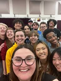 David Carew from Southwestern Michigan College came to work with all  Portage Northern Choirs today. Pictured are some of the Huskie Harmonizer  crew with Mr. Carew. We only took one picture as