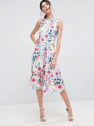 Because sometimes picking the best thing to wear to a wedding isn't always easy. 15 Floral Dresses Perfect For Summer Wedding Guests
