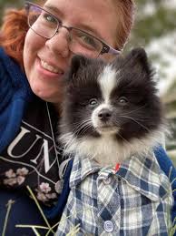 That kid holding his dog looks like you