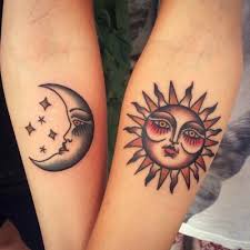 This tattoo includes two simple black inked rings tatted around the finger. Traditional Matching Sun And Moon Tattoos Friend Tattoos Sun Tattoos Tattoos