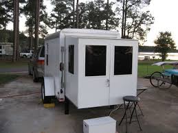 Enclosed trailer with ac is a new trend that can be seen around campgrounds. Cargo Campers Swing Out The Back Door And Pull Out The Slide Out Cargo Trailer Camper Cargo Trailer Conversion Cargo Trailer Camper Conversion