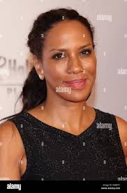 Hamburg, Germany. 17th Oct, 2013. Ice figure skater MacKenzie Crawford and  fashion designer Harald Gloeoeckler pose during a photo shooting