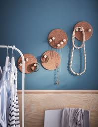 Old Corks Screwed Into Cork Pot Stands To Make Jewelry Storage That Hangs On A Wall Ikea Jewelry Storage Ikea Diy Jewellery Storage