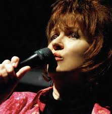 What's the format for a blues concert at the Logan Center?