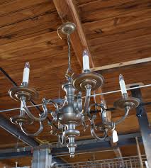 Which is too heavy to hang from a couple of hooks only. 6 Light Patina Heavy Brass Chandelier By Chapman Salvage One