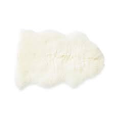 Feature a faux fur construction. Cream Sheepskin Single Rug