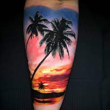 The shade from the leaves of the palm trees is like the cherry on top. Beach Sunset Tattoo Palm Trees Realistic Tattoo Sunset Tattoos Palm Tree Tattoo Tattoos