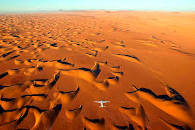 Sand dunes of sossusvlei and deadvlei in namibia (i.redd.it). Namibia Travel Guide