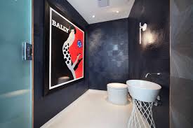 Each shelf is inserted with a hidden lighting that adds modern look to the space. Masculine Bathrooms Houzz