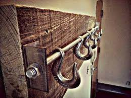 Hat hanger, hat holder, coat rack, cowboy hat rack, homemade, wall hat rack, rustic, cool. Need Ideas On How To Store Your Hats These Most Creative Hat Rack Ideas May Help You Doing Your Hat Organization S Industrial Coat Rack Diy Hat Rack Hat Rack