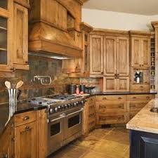 Decorate Your Kitchen With Natural Wood Cabinets In A Country Style Natural Wood Kitchen Cabinets Rustic Kitchen Rustic Kitchen Cabinets