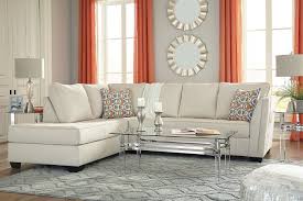 The Filone Living Room Collection By Signature Design Features Contemporary Style A Value City Furniture Sectional Sofa With Chaise Contemporary Sectional Sofa