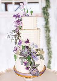 For a change, incorporate your wedding colours in the form fresh flowers (like this bride did with lavender) on top of a simple wedding cake. 65 Loveliest Lavender Wedding Ideas You Will Love Deer Pearl Flowers