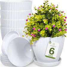 These are designed to allow for excess water to run off when placed outdoors. Amazon Com Botanica S Best 6 Inch Plant Pots For Plants Set Of 6 White Modern Indoor And Outdoor Plastic Planter Flower Pot For Office Decor And Patio Garden Planters Include