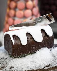 Slice Of Paris On Instagram The Buche Master Pierrehermeofficial Has Rolled Out Orpheo A Dark Chocolat Dark Chocolate Cakes Chocolate Cake Hazelnut Praline