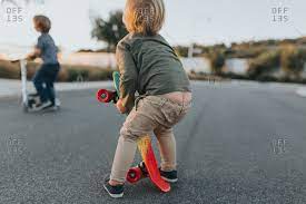 Use them in commercial designs under lifetime, perpetual & worldwide rights. Toddler Boy With Pants Falling Down Stock Photo Offset