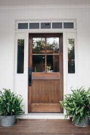 20 Beautifully Classic Farmhouse Stained Wood Doors Table And He Feedpuzzle House Exterior Beautiful Front Doors Modern Farmhouse