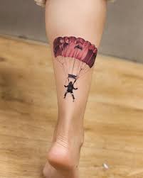 This is a beautiful and cute cloud tattoo on the shoulder of a girl. Parachute Tattoos Tattooed Tattoo Thebesttattooartists Art Beijing Ink Tattoos Tattooed Inkedmag Inst Tattoos For Guys Lion Forearm Tattoos Tattoos