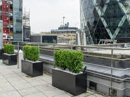 Extra large plastic container plant pots with handles 125lt £27.49. Black Polystone Trough Planter London Planters