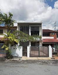 See more ideas about townhouse designs, terrace house, modern architecture. Small Terraced House Front Garden Ideas Discreet Modern Terrace House Exterior Hides A S Terrace House Exterior Industrial House Exterior Modern Terrace House