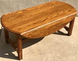 Handcrafted from select wood solids and wood products, the top features a maple and walnut veneer. Uhuru Furniture Collectibles 475096 Oak Drop Leaf Coffee Table 85 Sold