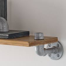 Pipe Mounted Wall Shelves And Art Holders