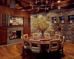 The coffee table is board game central on family night, the couch is large and ready with cozy blankets for rainy day movies, and the fireplace is where everyone gathers. Mountain Cabin Rustic Dining Room Charleston By Tidewater Lumber And Moulding Inc Houzz