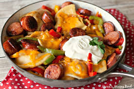Add pierogi and cooked kielbasa then gently stir until well incorporated into sauce. Skillet Kielbasa Sausage And Pierogies Maria S Mixing Bowl