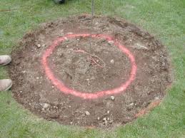 The actual fire pit itself will be deeper than the patio surround to accommodate the height of the concrete blocks. How To Prepare For A Fire Pit How Tos Diy