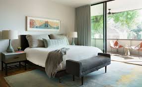 Although midcentury modern design is mostly clean and without excessive ornamentation, one exception to that rule is the use of angular or unusual light fixtures, particularly atomic styled fixtures, as seen in the beachy modern bedroom. Best 60 Modern Bedroom Night Stands Medium Hardwood Floors Design Dwell