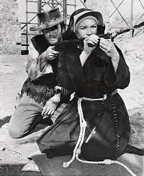 Yolculuklarını birlikte devam eden ikili, zamanla birbirleri hakkındaki gerçekleri öğrenecektir. Clint Eastwood And Shirley Maclaine In Two Mules For Sister Sara 1970 Photograph By Album