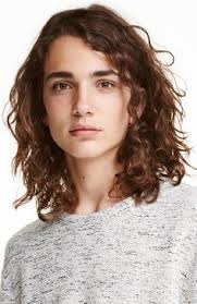 Pioneered by celebrities like miley cyrus, this style attracts many who want to make a statement that embraces the strength of masculinity with. Androgynous Male Models Curly Hair Hd Modello