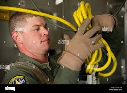 U.S. Army Staff Sgt. Evan Putman, a Explosive Ordnance Disposal (EOD),  competitor for the EOD Team of the Year for the Ordnance Crucible, clears a  mock runway from a emergency crash landing