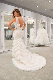 For The Glamorous Bride A Beaded Lace Mermaid Trumpet Galina Signature Wedding Dress Available Galina Wedding Dress Glamorous Bride Glitter Bridesmaid Dresses