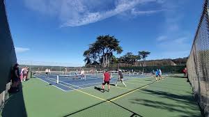 The girls were playing tennis in the tennis court. San Francisco Pickleball Community Posts Facebook