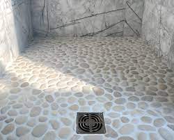 The rationale for tiling the floor first is simple, expansion and contraction joints will be hidden by wall tiles. Tips For Installing And Cleaning A Pebble Stone Shower Floor The Washington Post